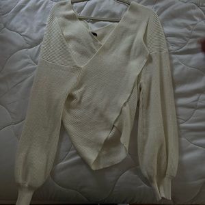 White cross sweater